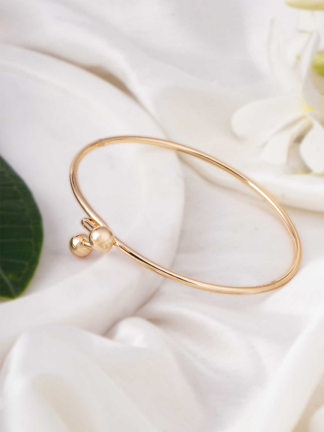 

Adwitiya Collection Women Brass Gold-Plated Kada Bracelet