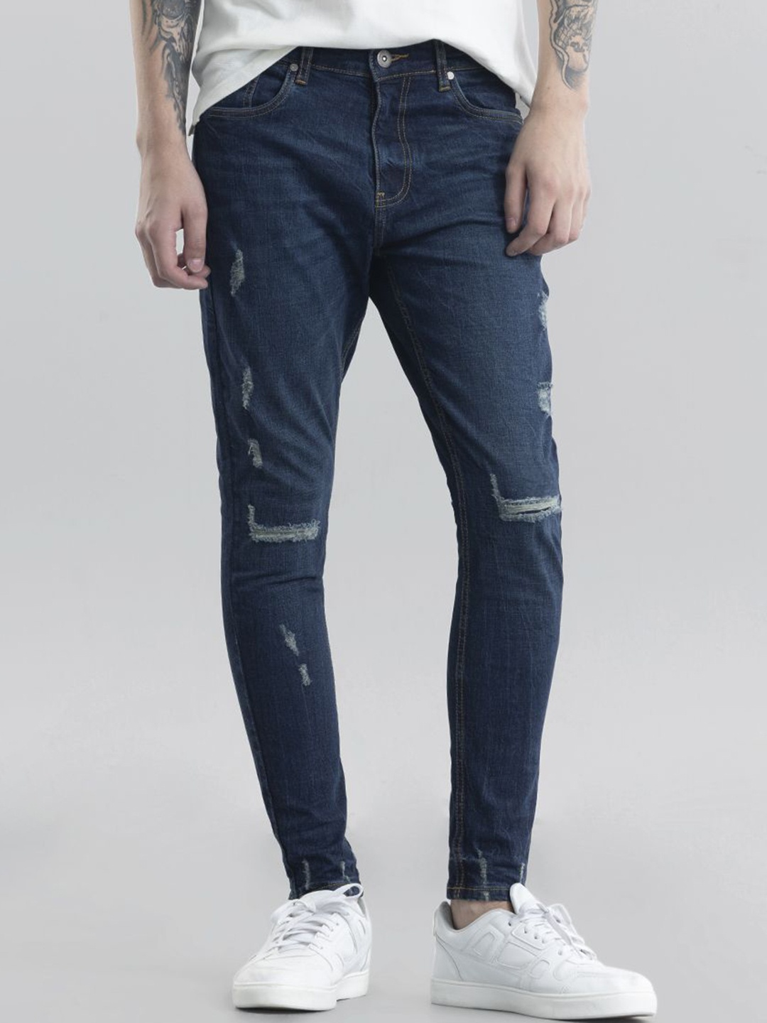 

Snitch Men Classic Skinny Fit Low Distress Light Fade Stretchable Jeans, Blue