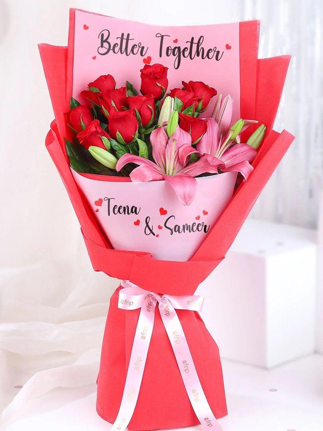 

fnp Red 12-Pieces Roses & Lily Flower Bouquet