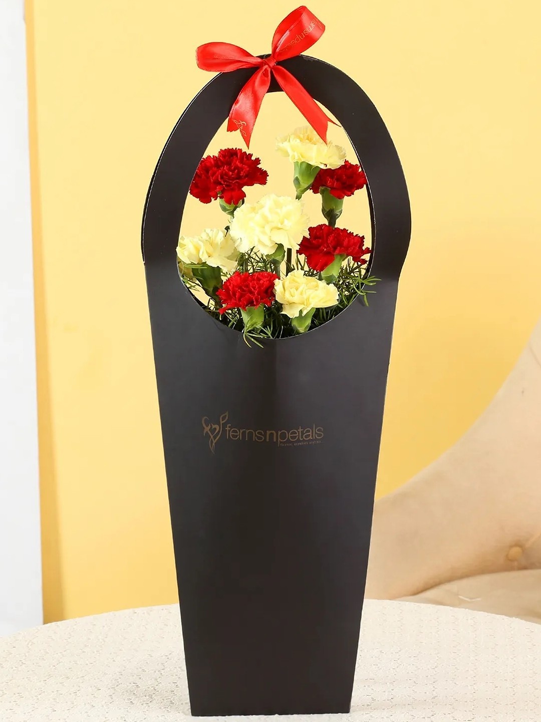 

fnp Red & Yellow 8 Pieces Carnations Fresh Flowers In Sleeve Bag