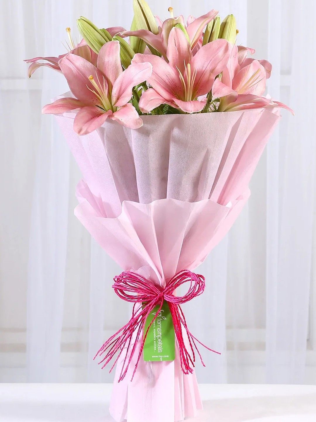 

fnp Admirable Pink 7 Pieces Asiatic Lilies Fresh Flowers Bouquet