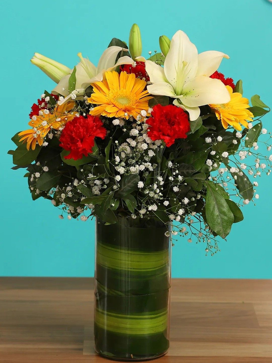 

fnp Red 12 Pieces Lilies Carnations & Gerberas Fresh Flowers Bouquet, Yellow
