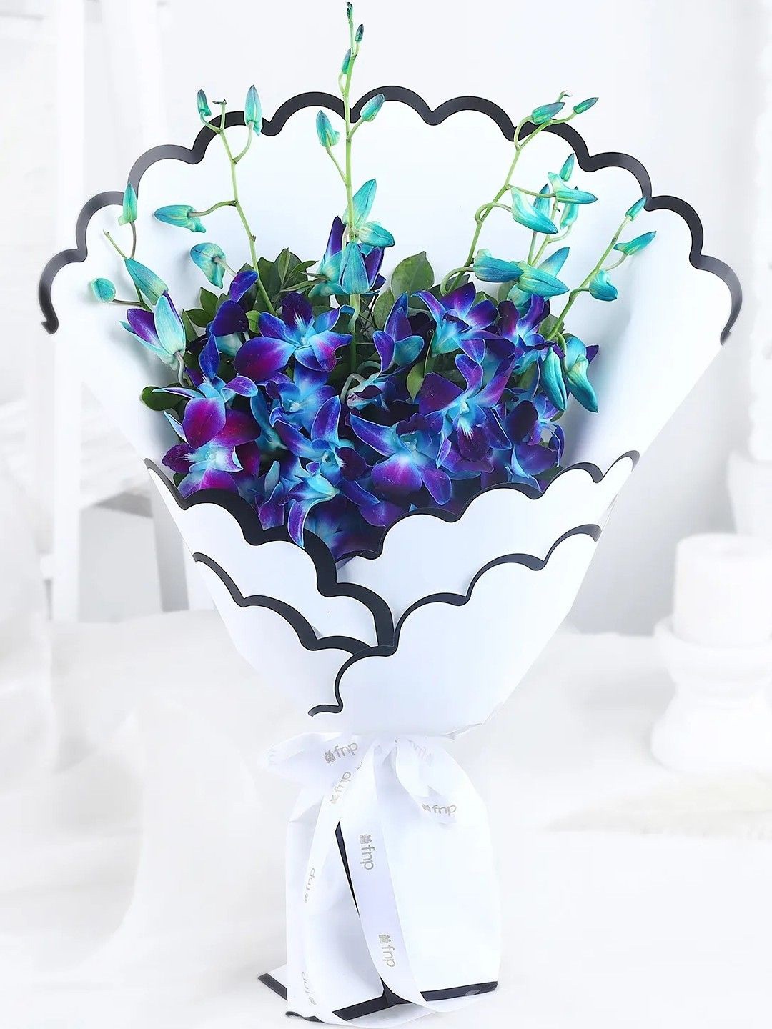 

fnp Blue & Green 6 Pieces Orchids Fresh Flowers Bouquet