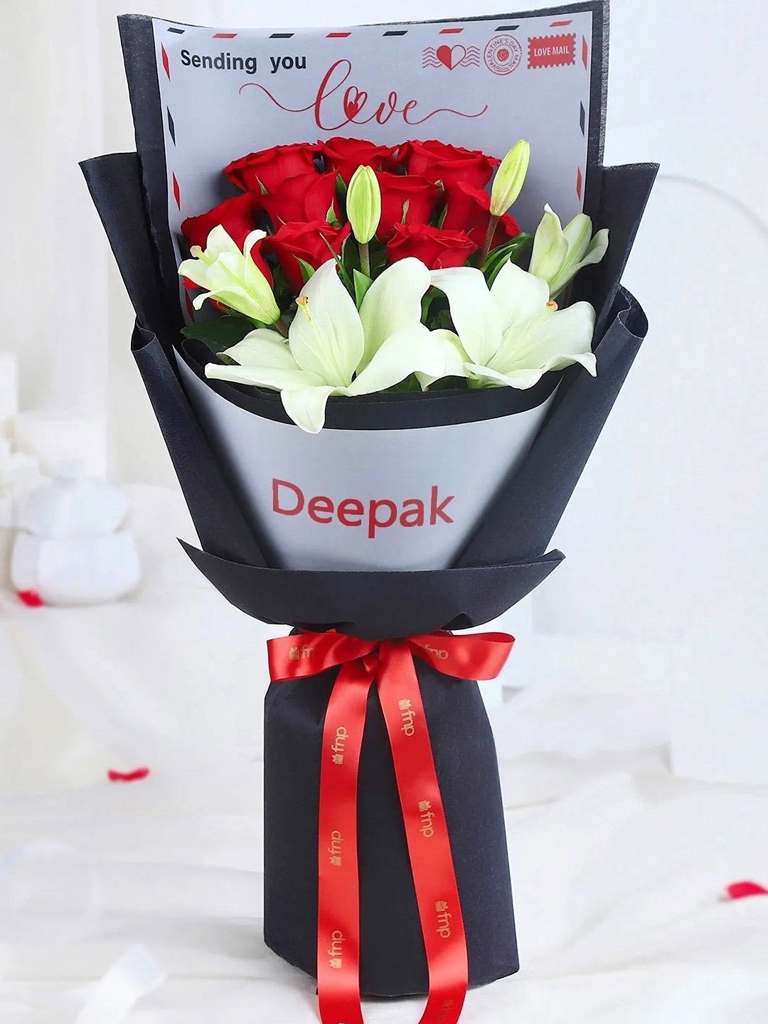 

fnp White & Red 12 Pieces Roses & Lily Love Blossoms Bouquet