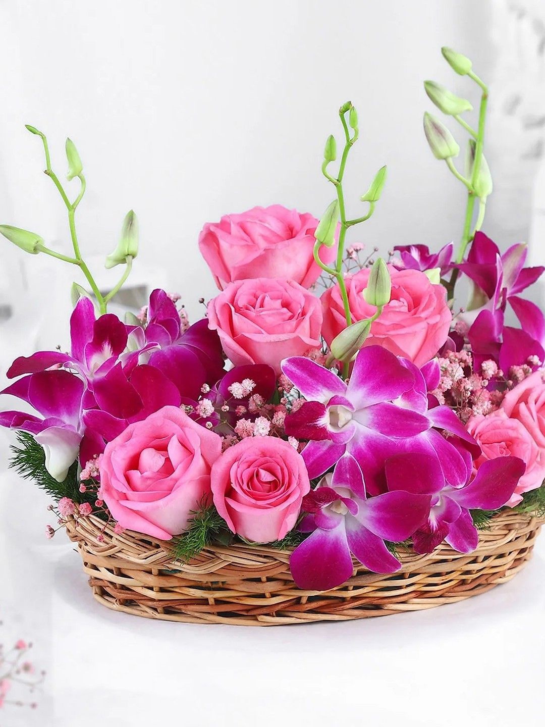 

fnp Purple & Pink 15 Pieces Orchid Fresh Flowers Basket