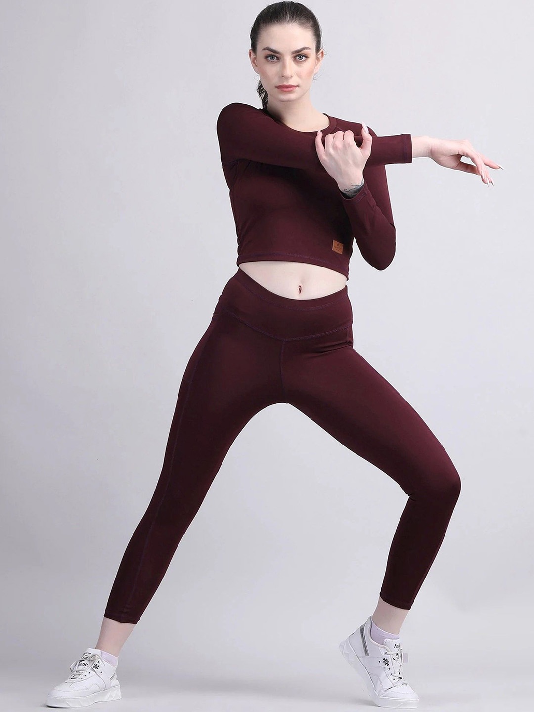 

Raxedo Compression Fit Women Tracksuits, Maroon