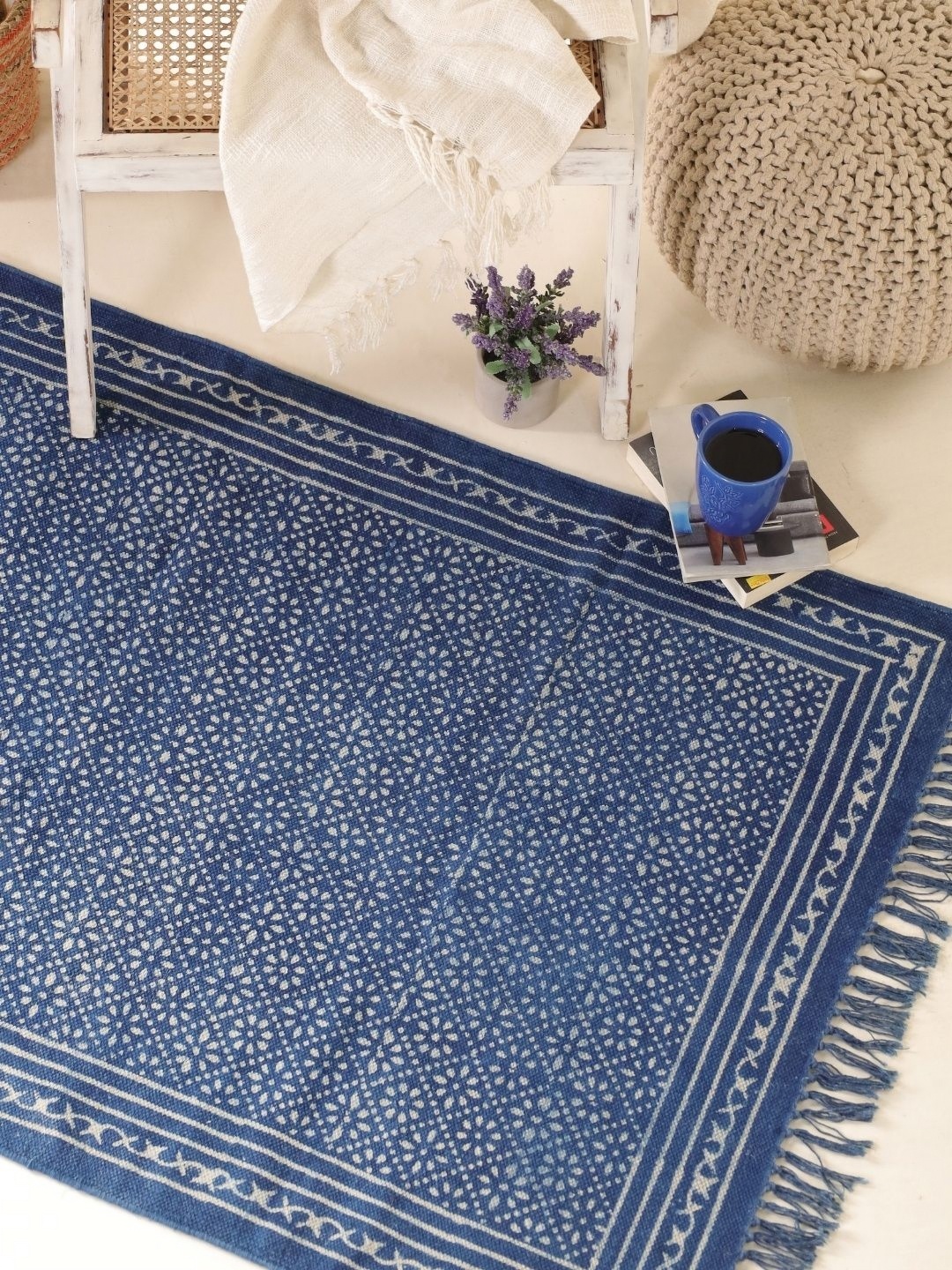 

Peepul Tree Navy Blue & White Handmade Floral Cotton Carpet