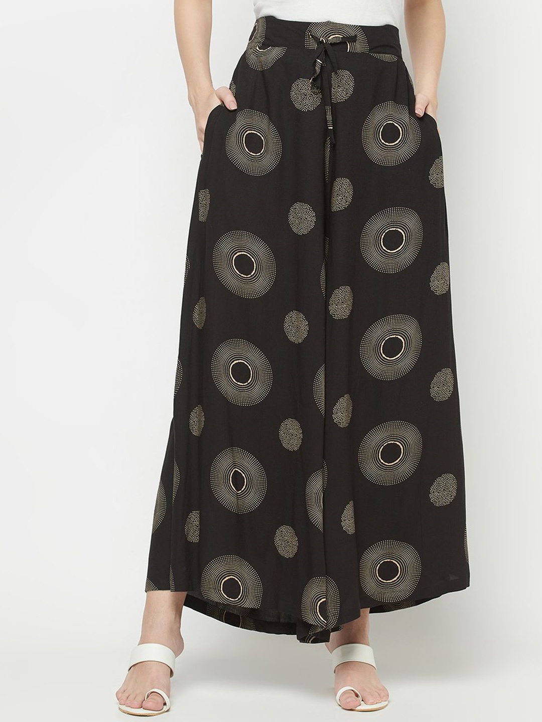 

Purple State Women Printed Flared Palazzos, Black
