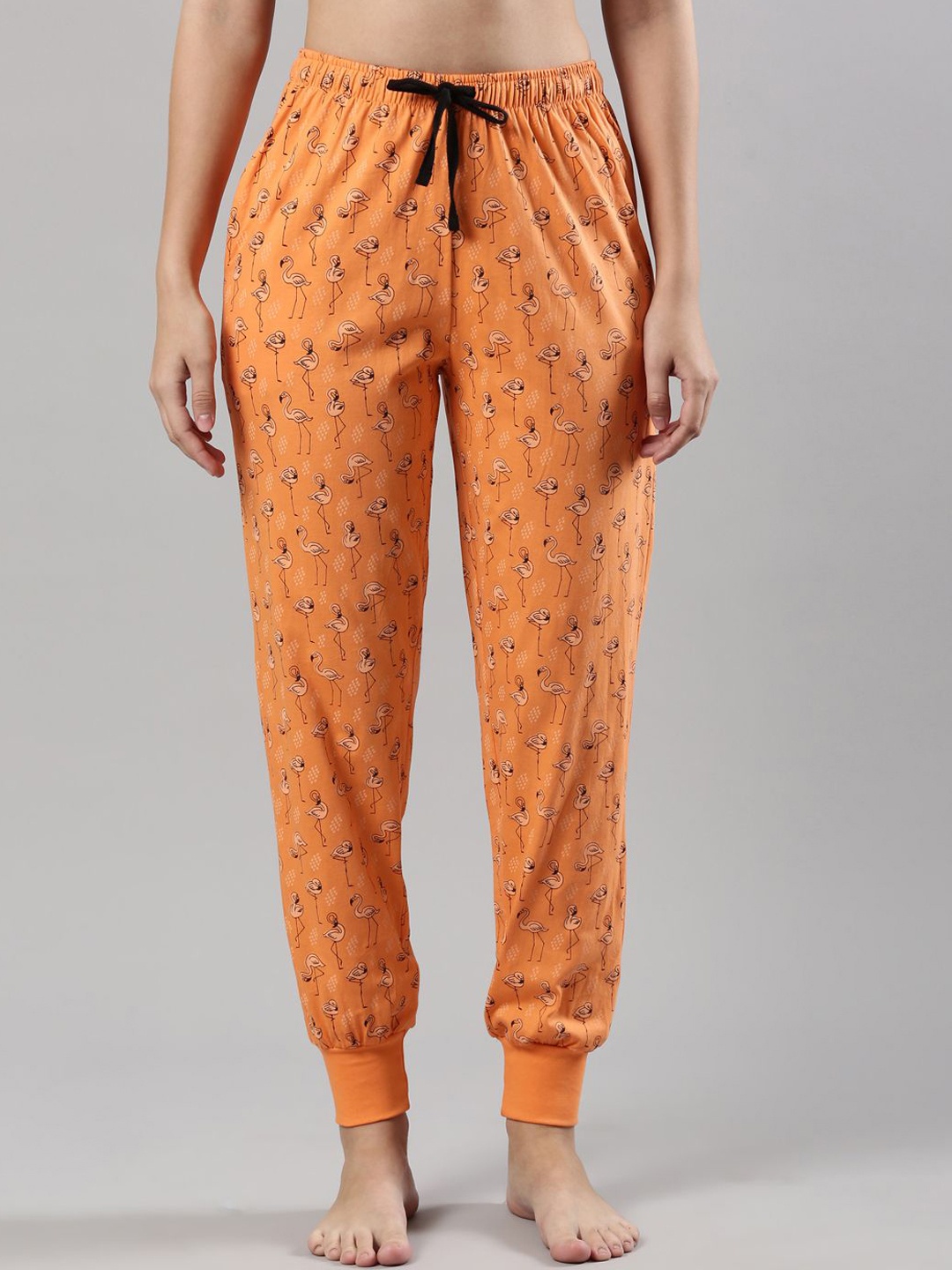 

Femmora Women Abstract Printed Mid-Rise Relaxed Fit Pure Cotton Lounge Pants, Orange