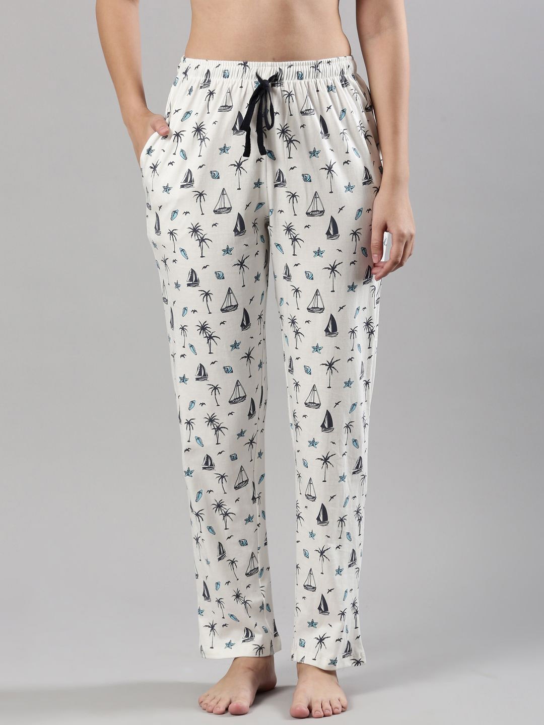 

Femmora Women Abstract Printed Mid-Rise Pure Cotton Lounge Pants, Off white