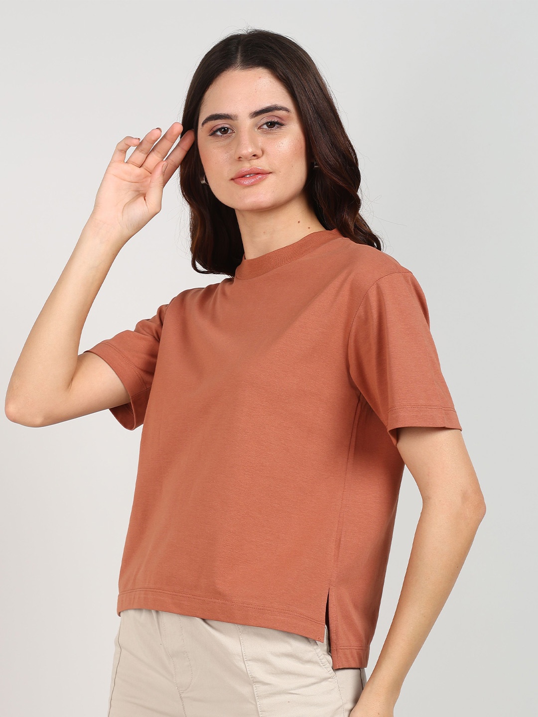 

Alan Jones Women Solid Round Neck T-shirt, Brown