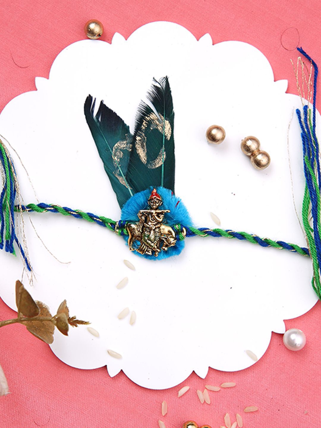 

Aapno Rajasthan Divine Basuri Krishna Multistrand Rakhi With Roli Chawal & Greetings Card, Blue