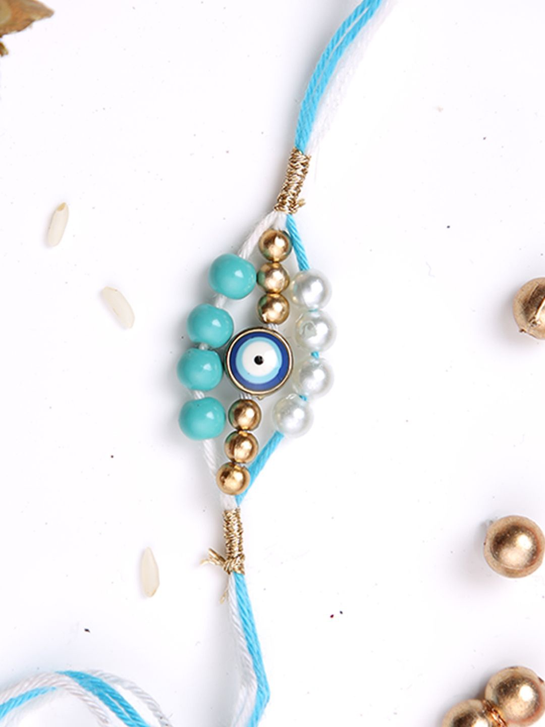 

Aapno Rajasthan Evil Eye Beaded Multistrand Rakhi With Roli Chawal & Greetings Card, Blue