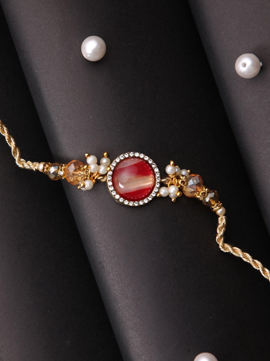 

Aapno Rajasthan Beaded Thread Rakhi with Roli Chawal & Greetings Card, Gold