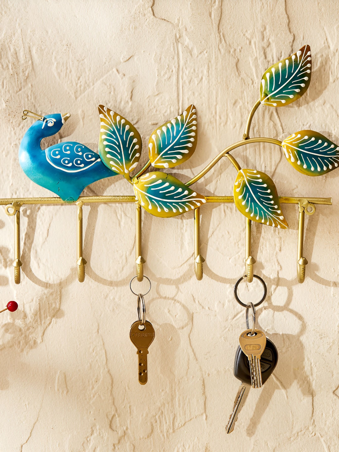 

Home Centre Corsica Gold Toned & Blue Iron Peacock Wall Hooks