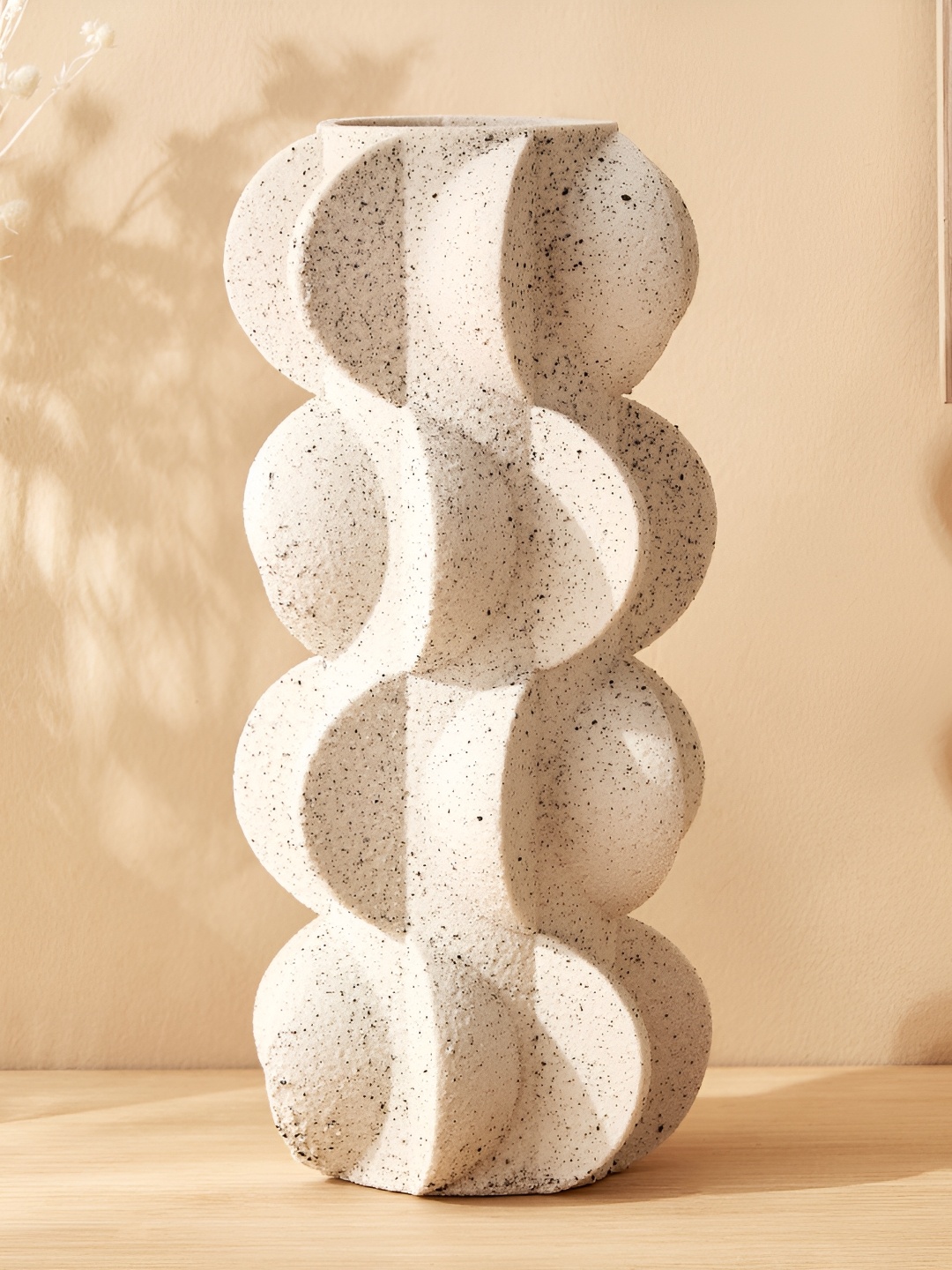 

Home Centre Natura Cream & Black Curved Vase