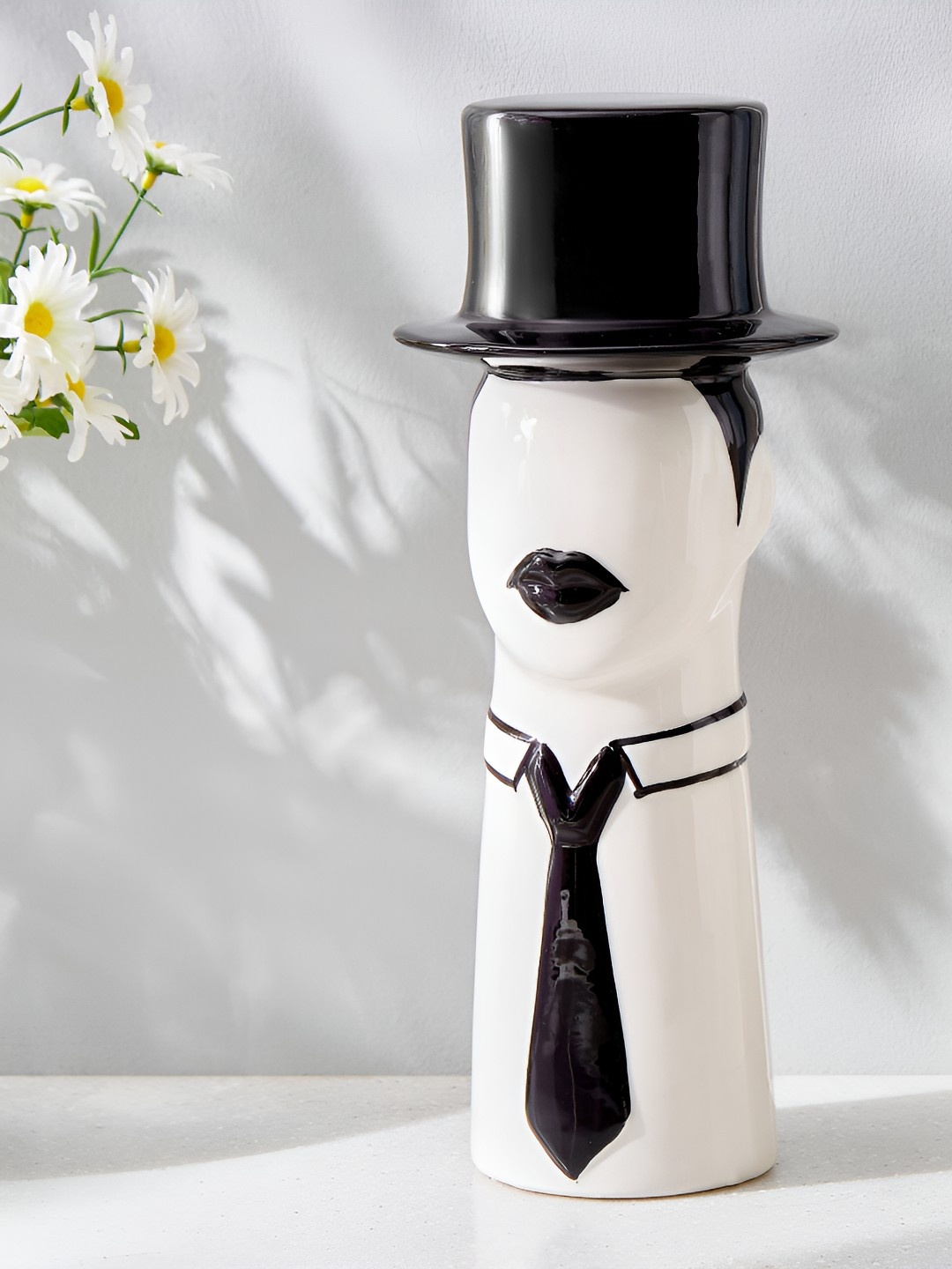 

Home Centre White Man with Hat Figurine Showpiece