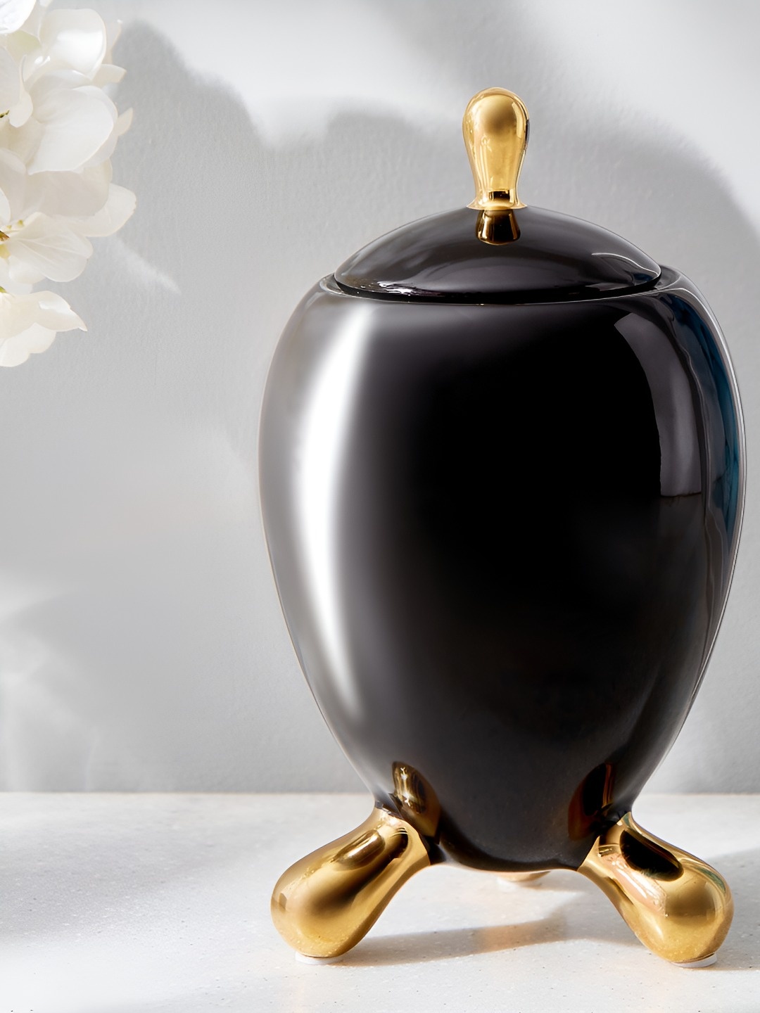 

Home Centre Black Figurine Decorative Showpiece