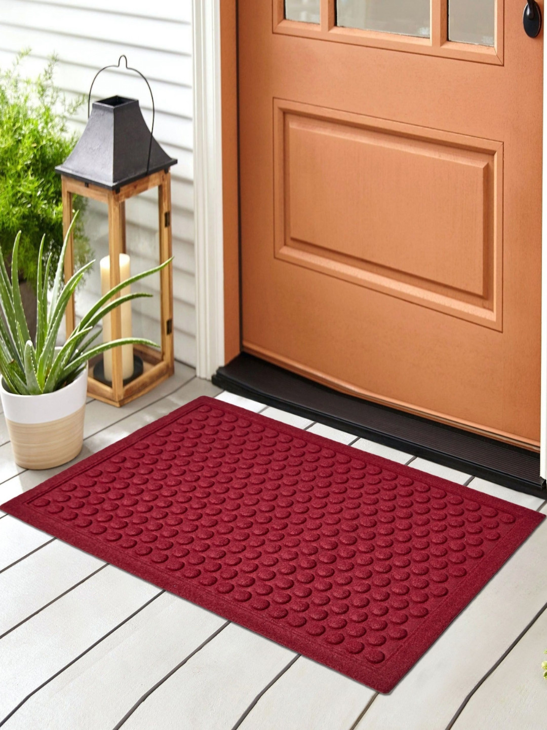 

Home Centre Maroon Textured Rubber Embossed Outdoor Doormats