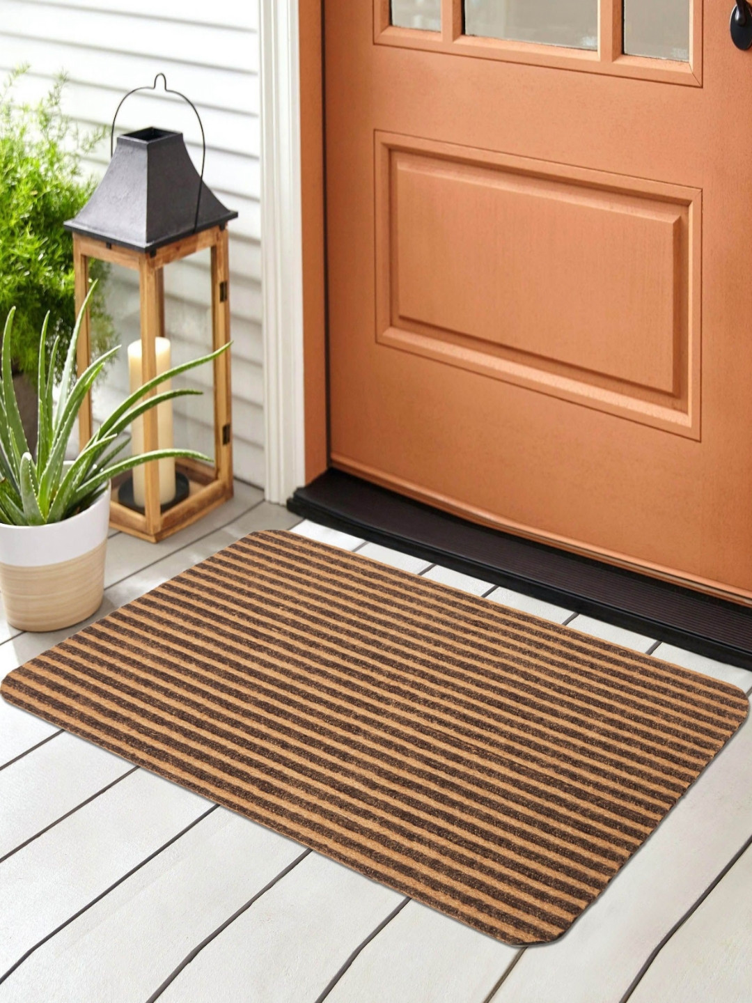 

Home Centre Brown & Black Striped Outdoor Doormats
