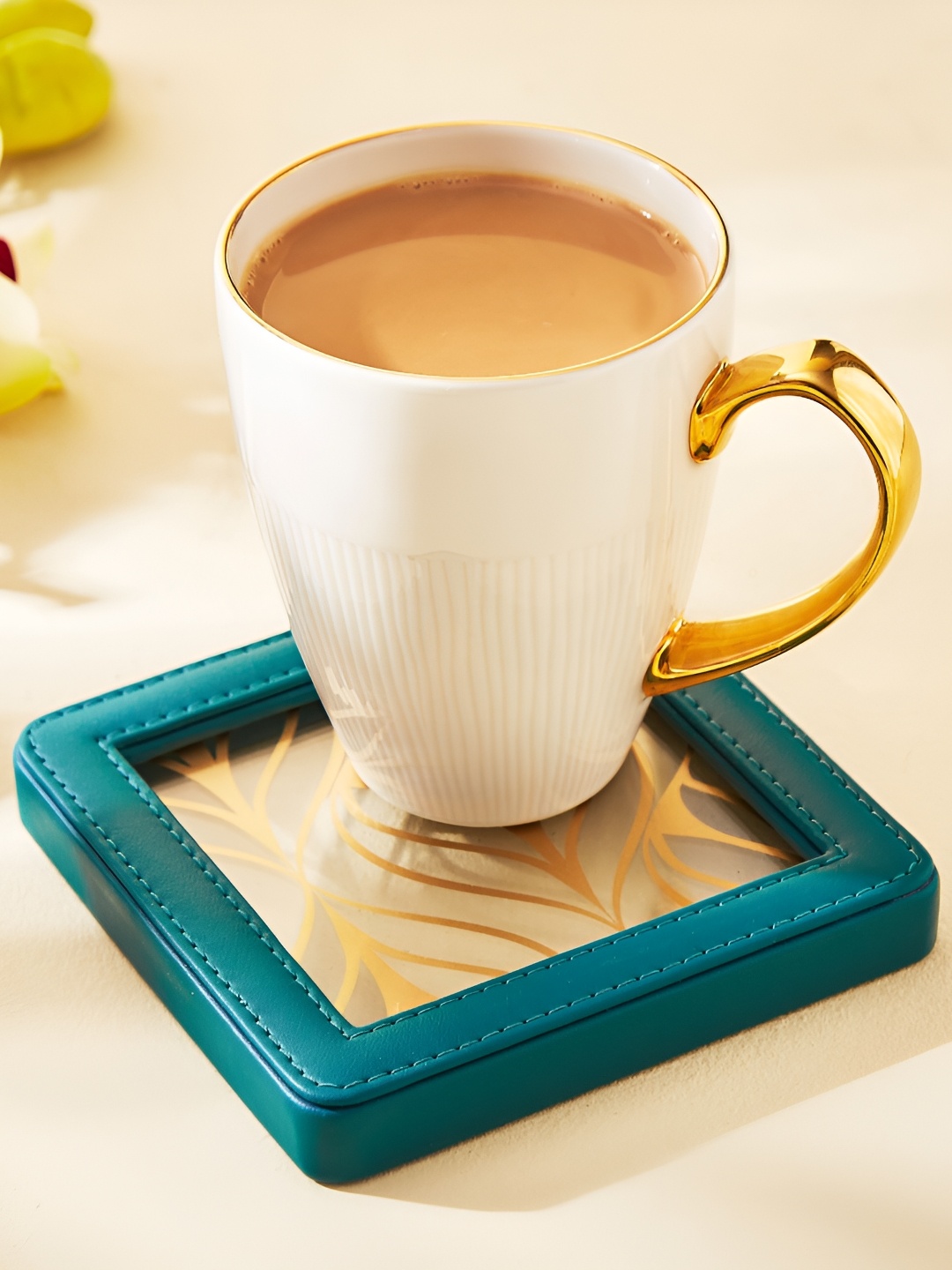 

Home Centre Teal Blue & Yellow Printed Coasters