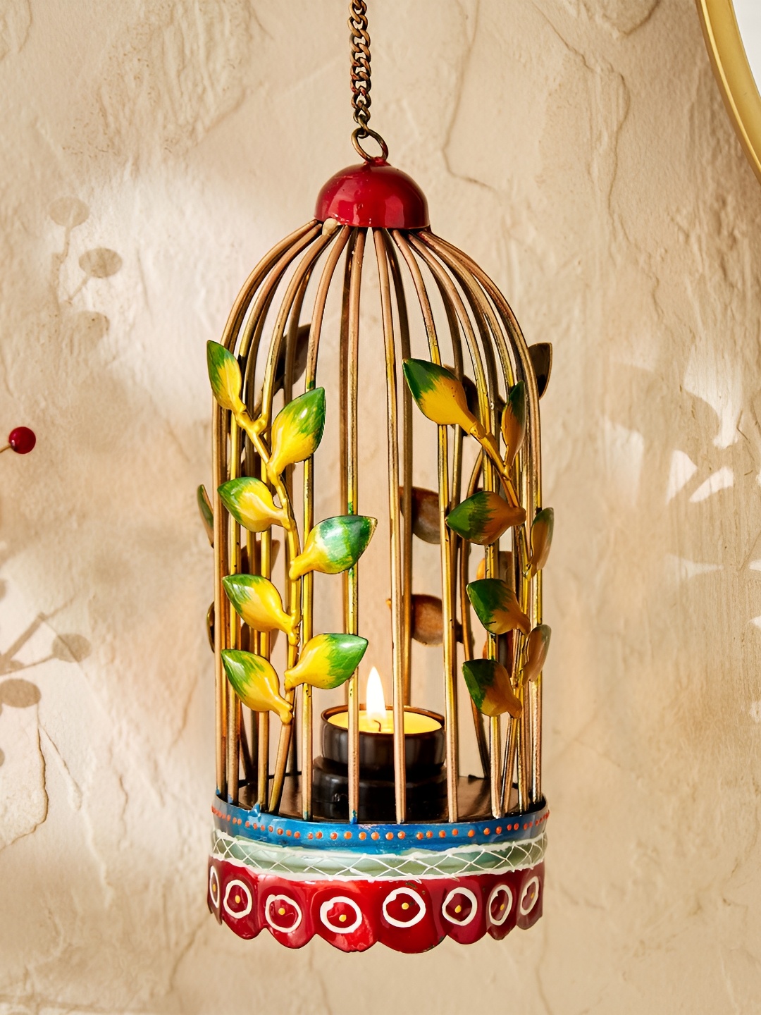 

Home Centre Corsica Red & Green Textured Iron Hanging Cage T-Light Holder