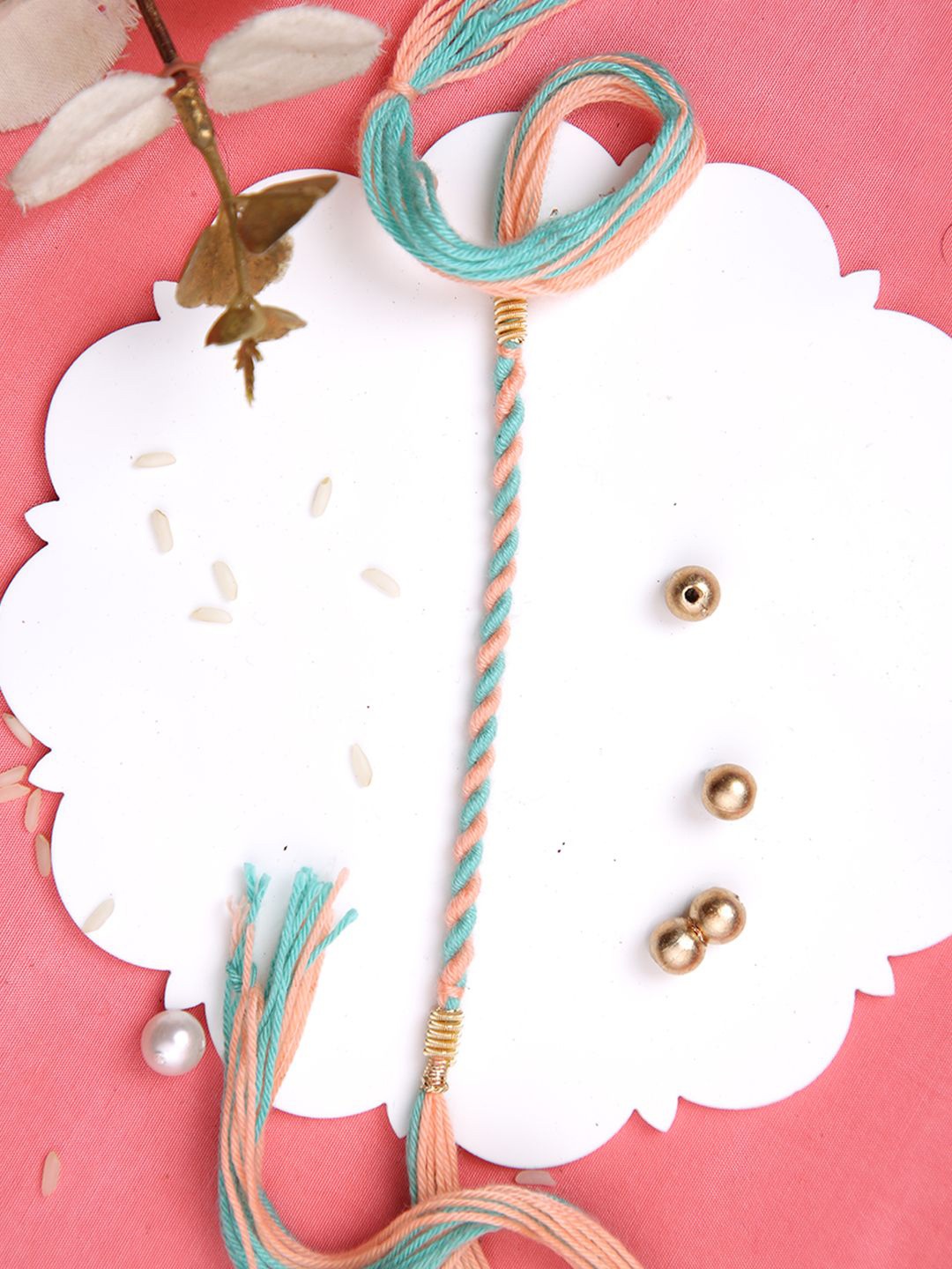 

Aapno Rajasthan Twisted Multistrand Rakhi With Roli Chawal & Greetings Card, Blue