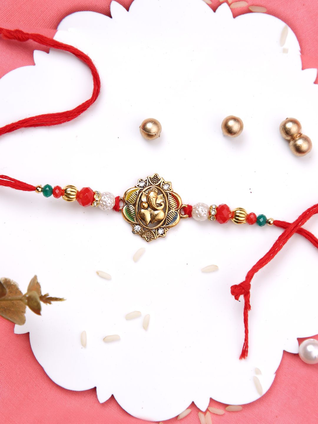 

Aapno Rajasthan Beaded Thread Rakhi with Roli Chawal & Greetings Card, Gold