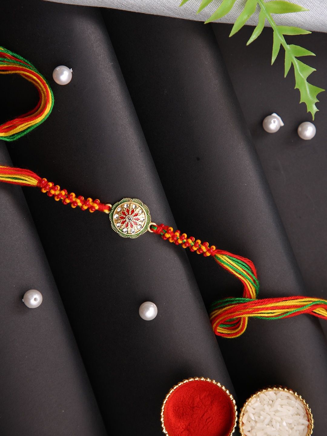 

Aapno Rajasthan Stone Studded Rakhi With Roli Chawal & Greeting Card, Red