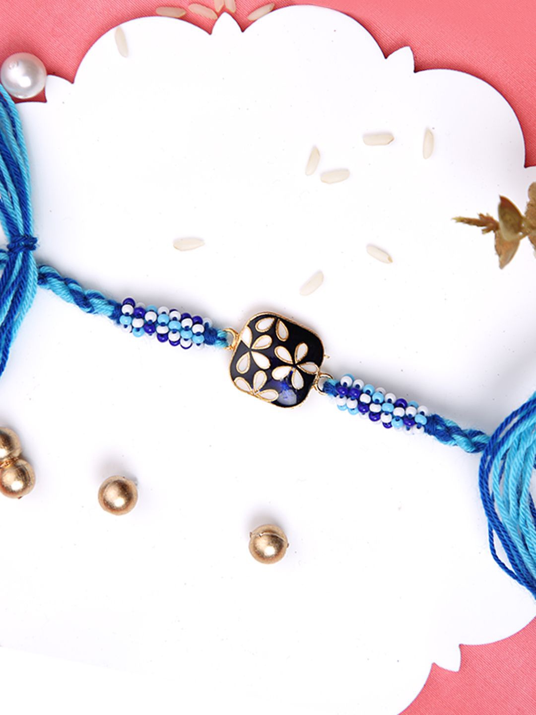 

Aapno Rajasthan Beaded Rakhi With Roli Chawal & Greeting Card, Blue