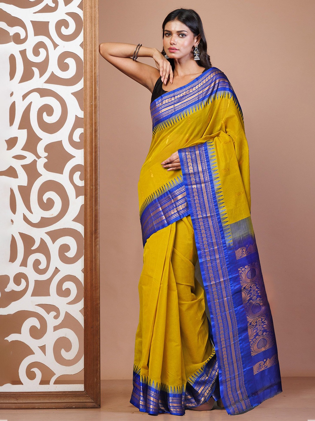 

Unnati Silks Woven Design Zari Pure Cotton Handloom Gadwal Saree, Yellow