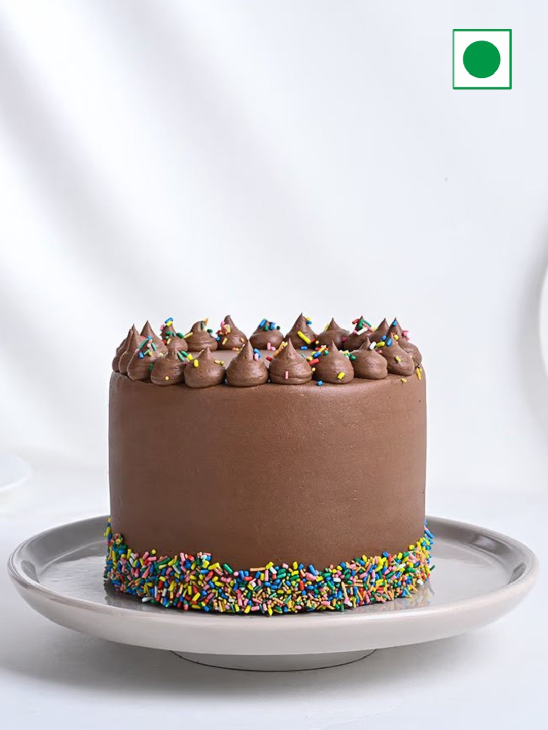 

Floweraura Round Shape Chocolate Flavor Eggless Round Cake- 1 kg, Brown