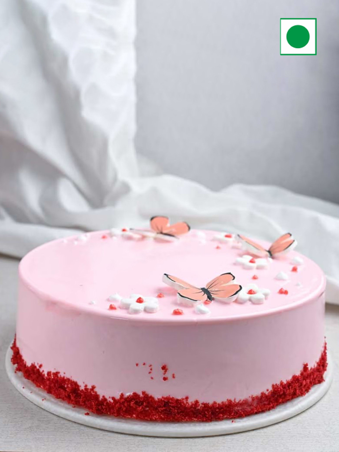 

Floweraura Round Shape Red Velvet Flavor Eggless Round Cake- 1kg, Pink