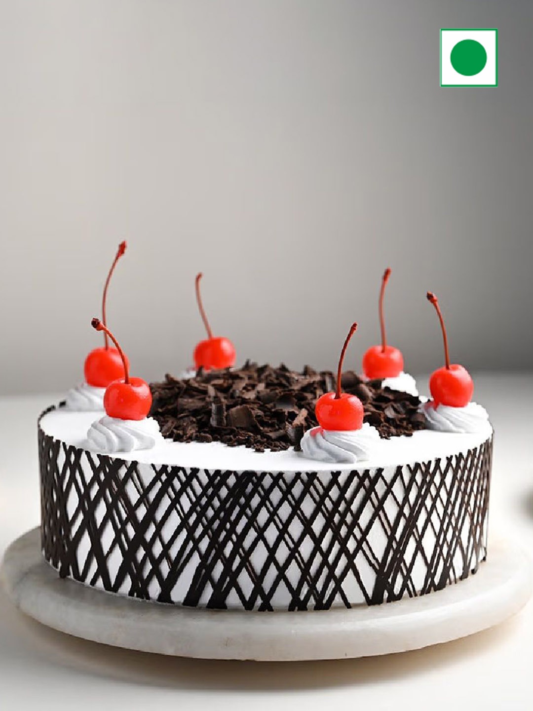 

Floweraura Cherrilicious Black Forest Flavor Eggless Round Cake- 1 Kg, White
