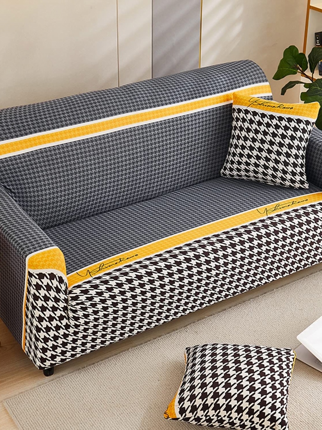 

Furshine Black & White Printed Stretchable Sofa Cover