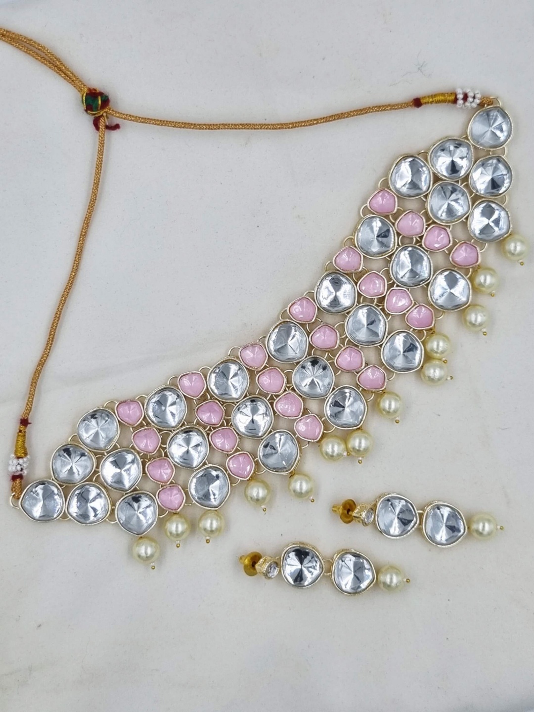 

Anouk Gold Toned Gold Plated Kundan Studed & Beaded Jewellery Set