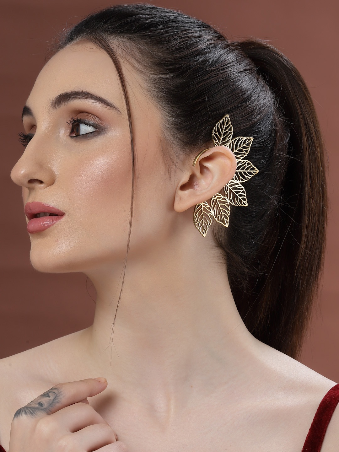 

Sanjog Gold-Plated Contemporary Leafy Statement Ear Cuffs Earring