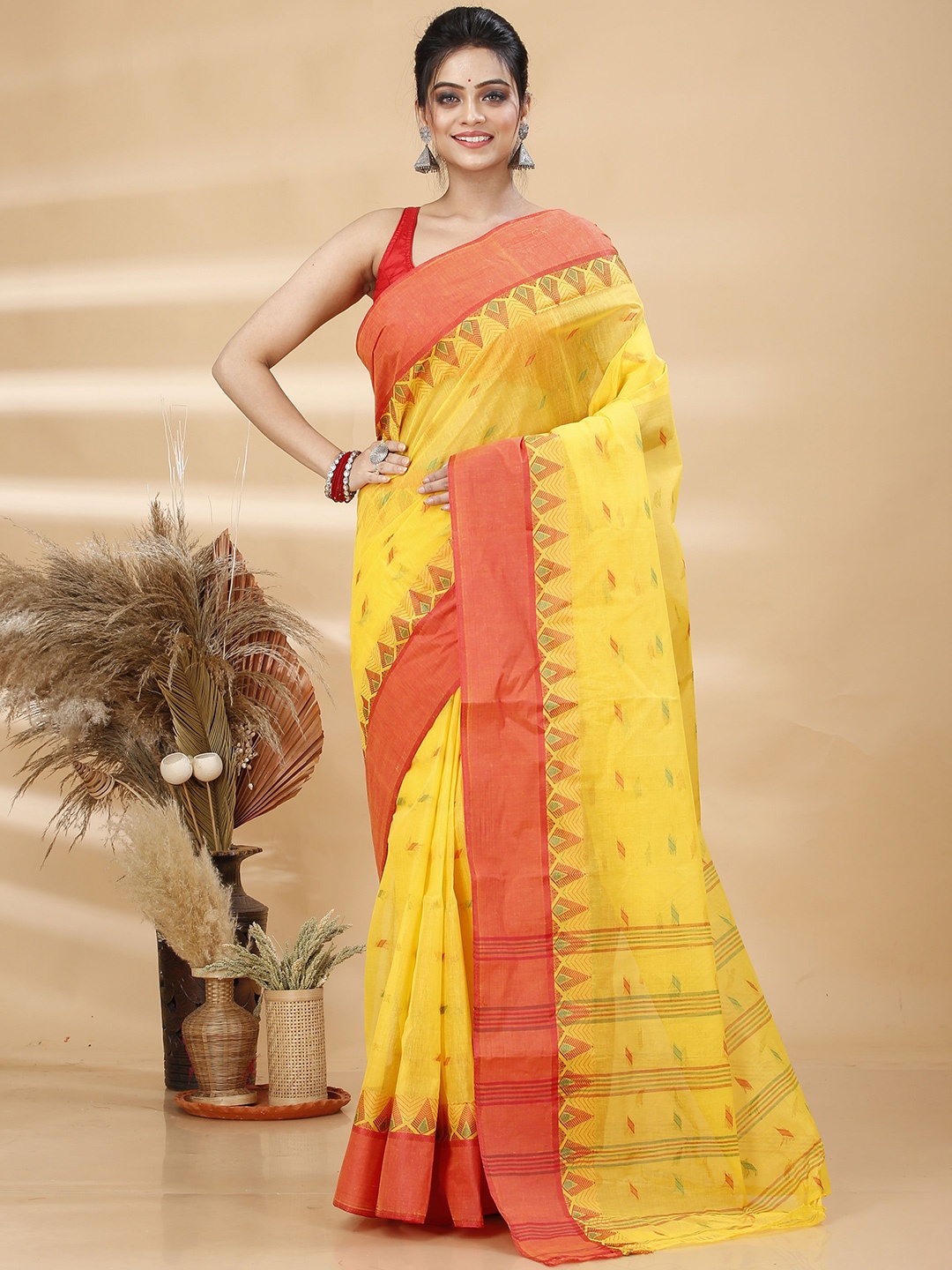

Ruuprekha Woven Design Pure Cotton Taant Saree, Yellow