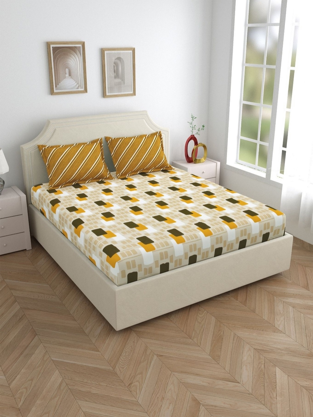 

Salona Bichona Mustard & White Geometric 120 TC Cotton Queen Bedsheet With 2 Pillow Covers