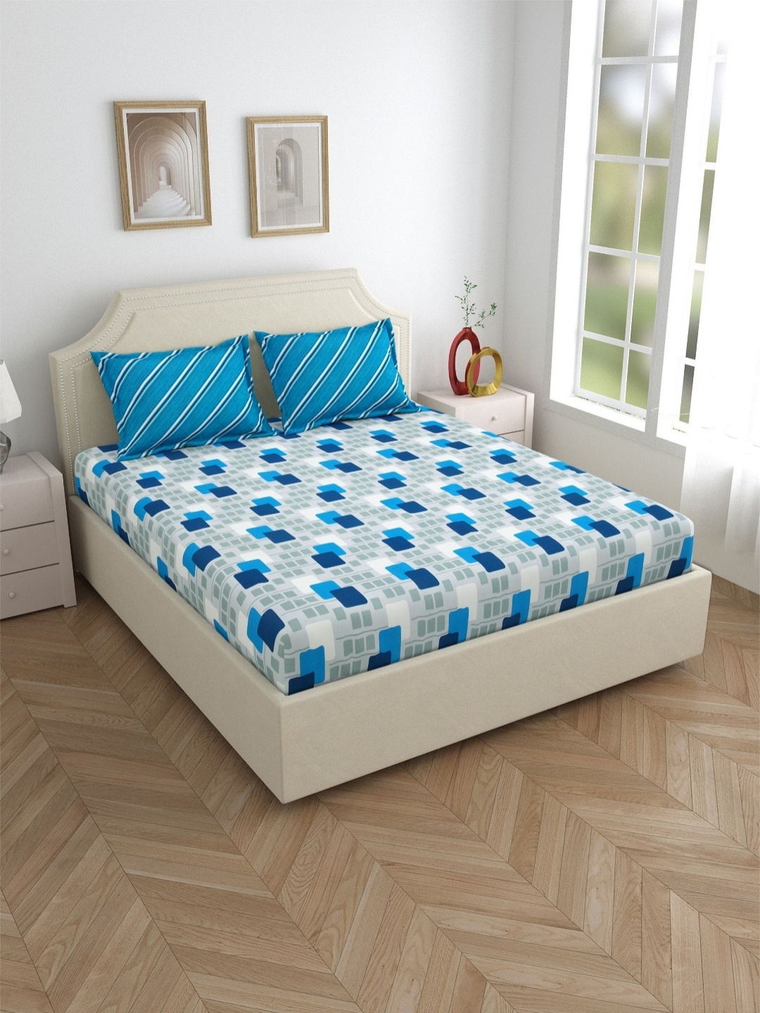 

Salona Bichona Blue & White Geometric 120 TC Cotton Queen Bedsheet With 2 Pillow Covers