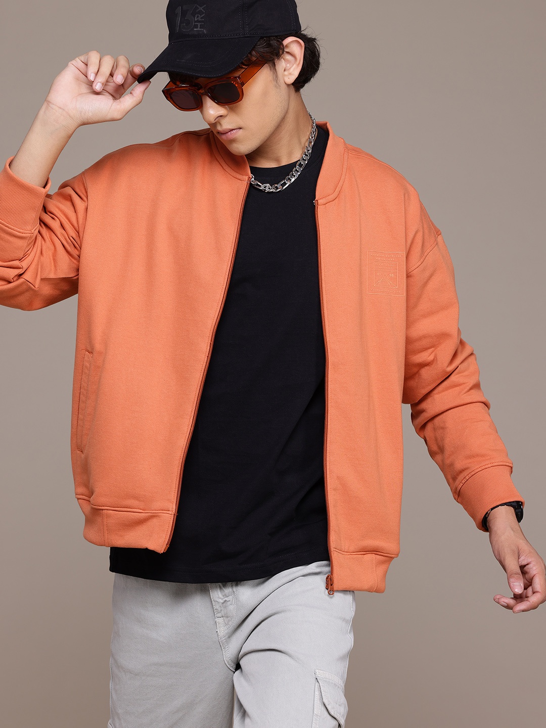 

The Roadster Lifestyle Co. Men Relaxed Fit Sweatshirt, Orange
