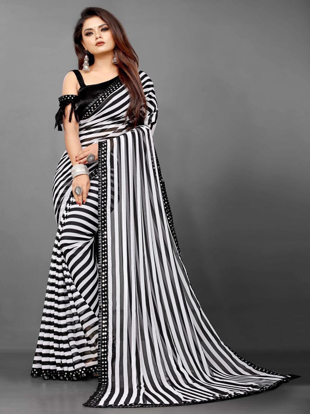 

limtd Striped Sequinned Pure Georgette Saree, Black