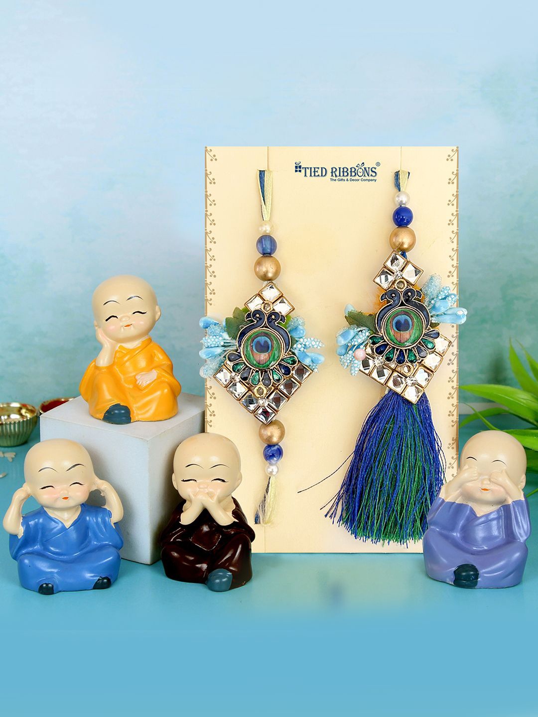 

Tied Ribbons Set of 2 Bhaiya Bhabhi Peacock Rakhi, Idol Card & Roli Chawal Set, Yellow