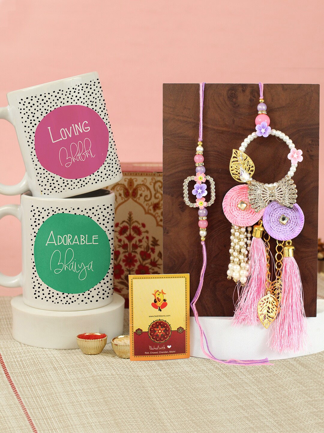 

Tied Ribbons Set of 2 Lumba Rakhis & Printed Coffee Mugs Gift Set, Blue