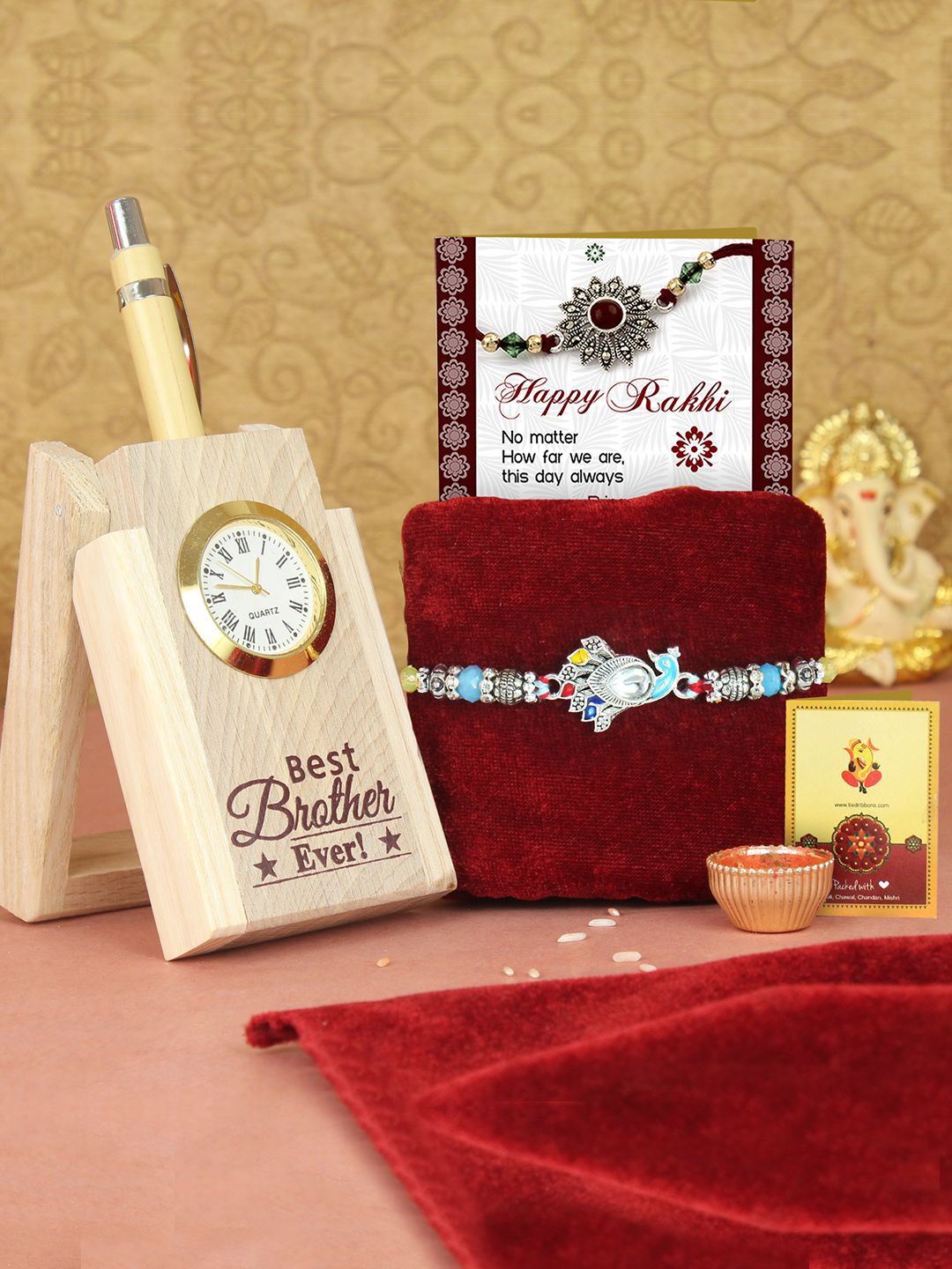 

Tied Ribbons Peacock Rakhi, Wooden Pen Stand & Card Gift Pack, Blue