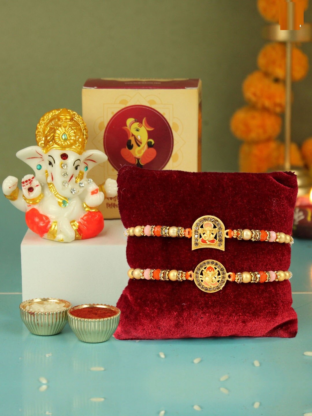 

TIED RIBBONS Set Of 2 Ganesh Rakhi for Brother With Idol Combo Gift, White