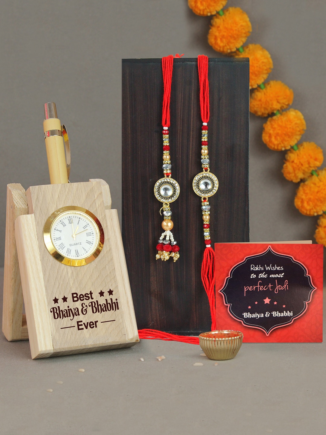 

TIED RIBBONS Bhaiya Bhabhi Rakhi With Pen Stand Card Tikka Gift Set, Gold