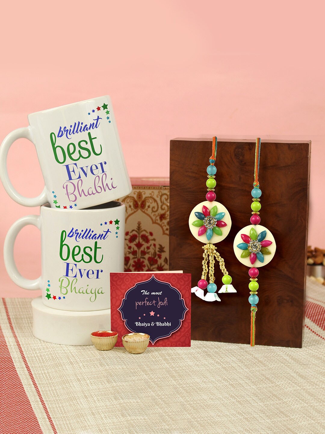 

Tied Ribbons Set of 2 Rakhi, Coffee Mugs, Greeting Card & Roli Chawal Gift Set, White