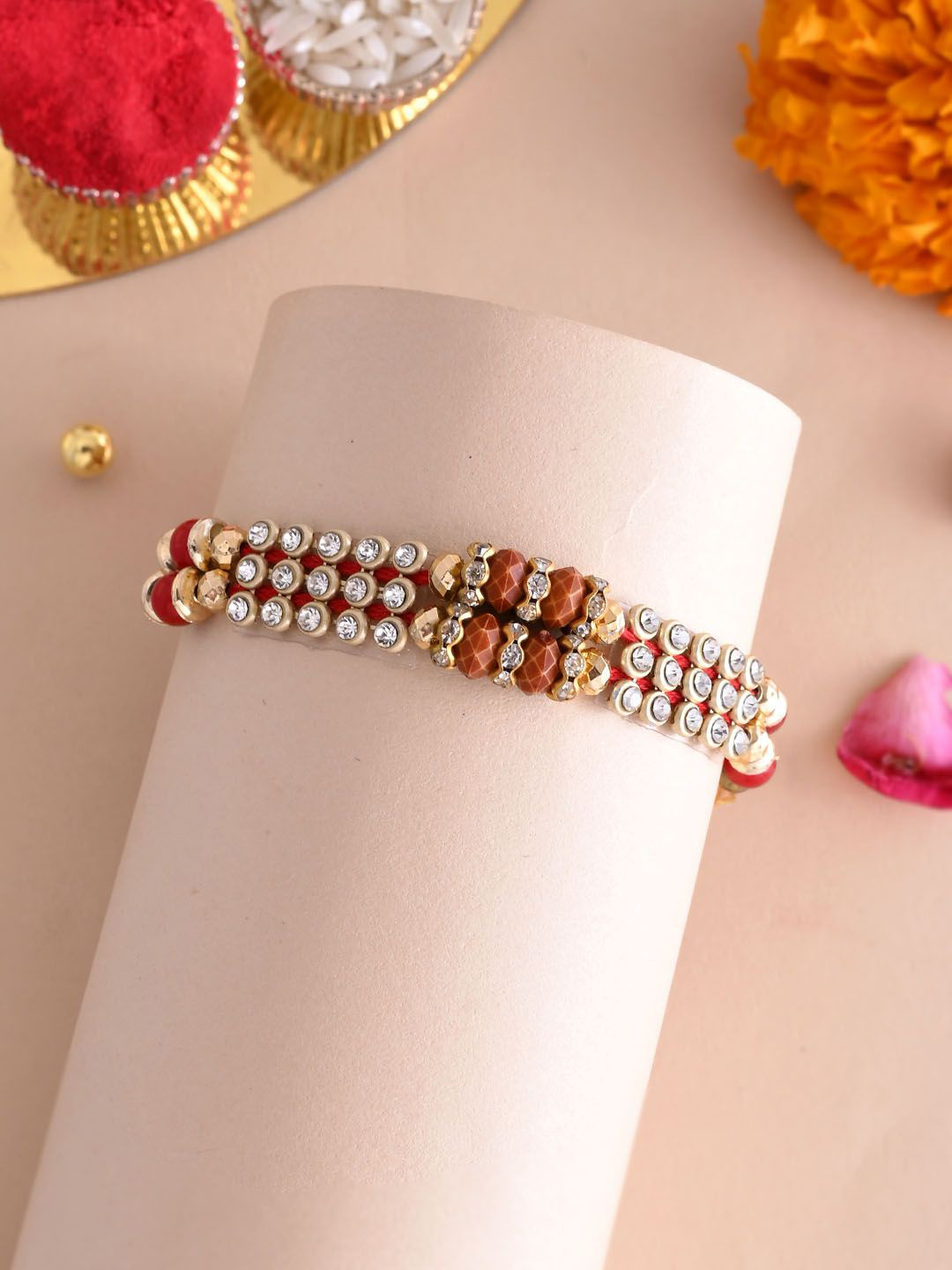 

Aapno Rajasthan Stone Studded & Beaded Rakhi With Roli Chawal & Greetings Card, Gold