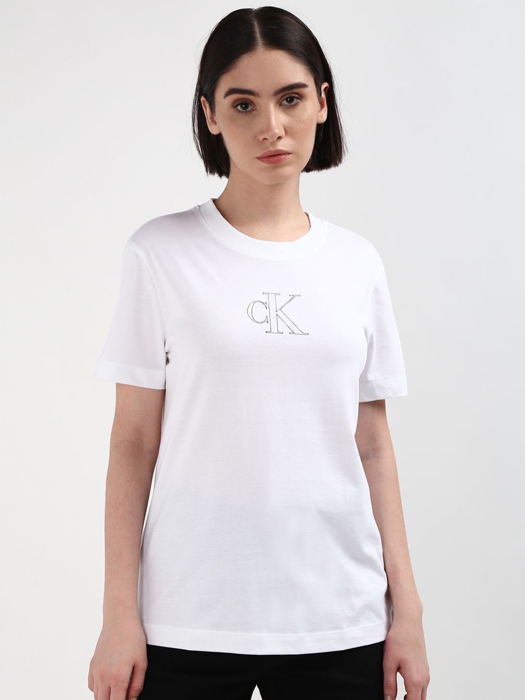 

Calvin Klein Jeans Women Solid Round Neck T-shirt, White